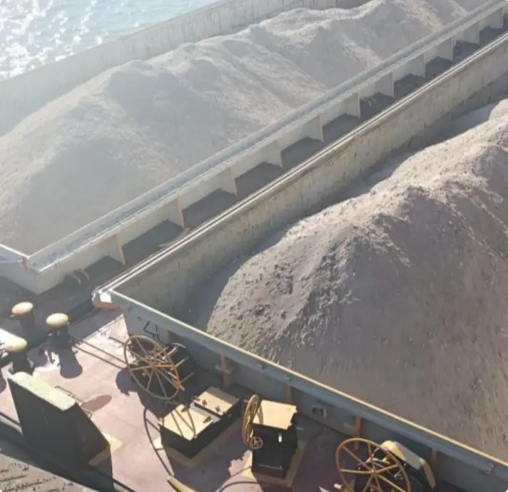 Barge holds loaded with granulated blast furnace slag