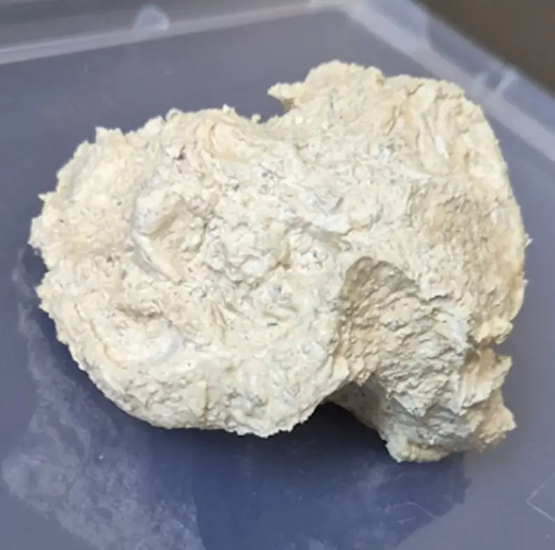 Lump of raw kaolin, a cream-white clay